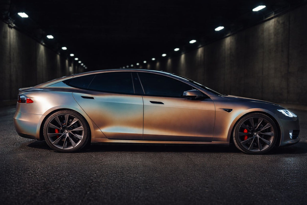Silver wrapped Mercedes-Benz coupe shown from the side