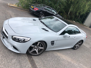 Mercedes-Benz SL wrapped in Arlon Nardo Grey by Wraptastic, elevated front and side view